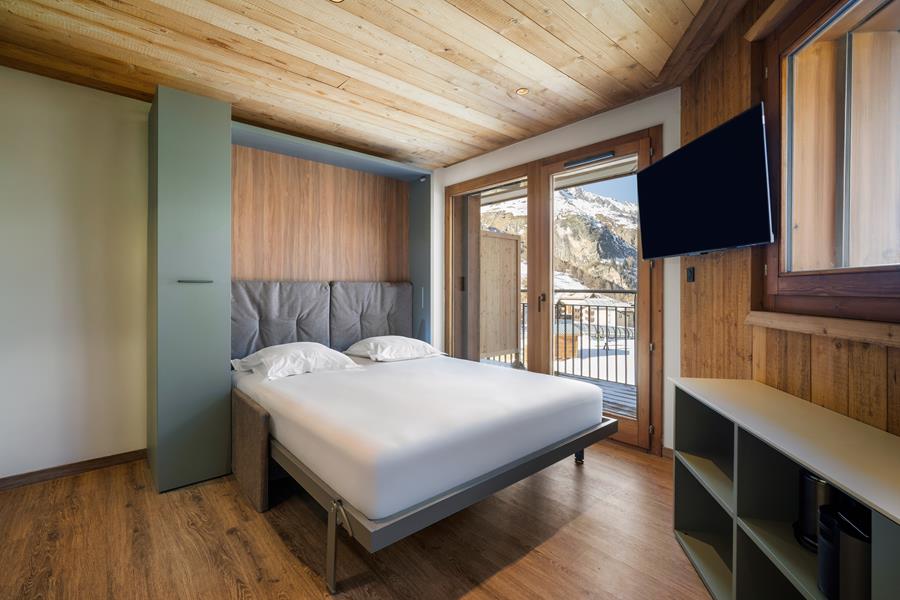 1 lit rabattable dans le séjour en 160*200	