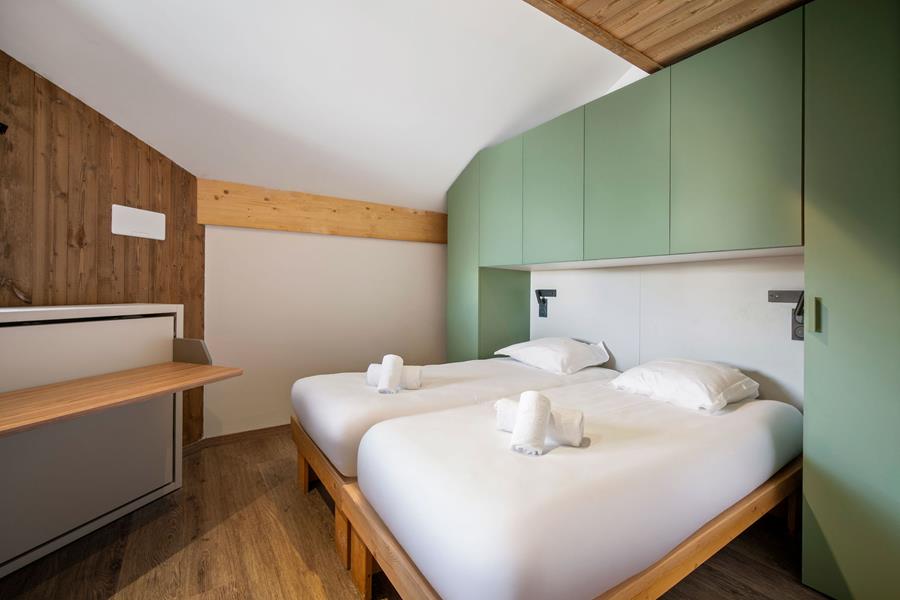 2 lits simples (90*200) + 1 lit escamotable en 80*190