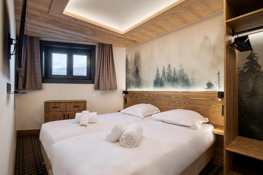 2 lits simples (90*200) avec TV